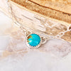 Small turquoise pendant on sterling silver chain