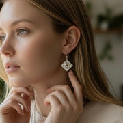 Sterling silver earrings with a splash of red coral