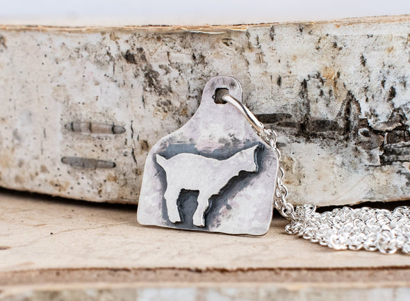 cow tag necklace with goat